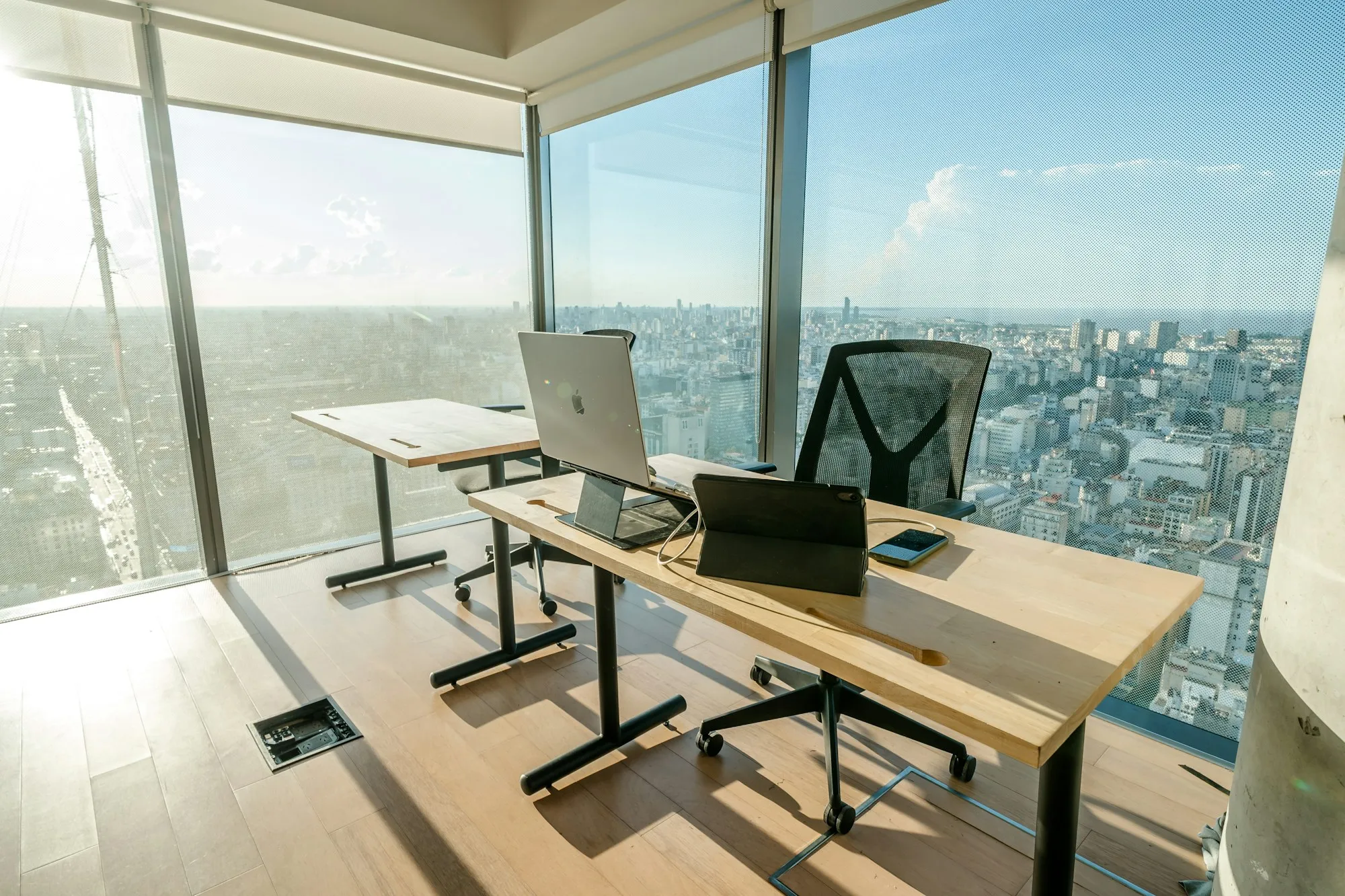 A modern office meeting room with a city view